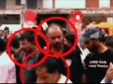 Screen capture of policemen involved in the Sialkot lynching.