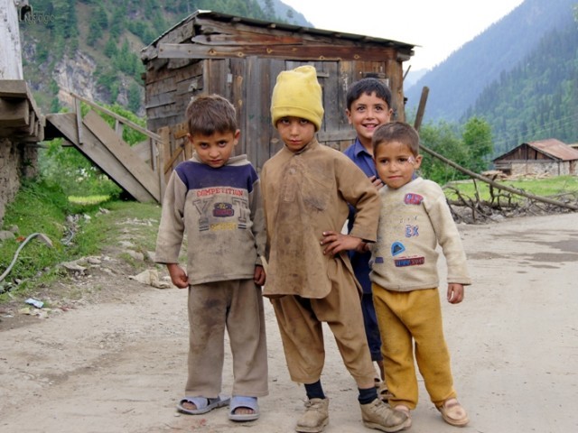 Kids posing for the camera in Kel, Kashmir. PHOTO: NOSTALGIC'S PHOTOGRAPHY